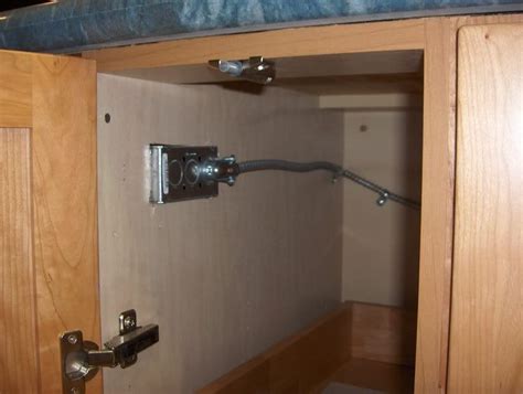 mounting electrical box in cabinet|electrical outlet box in cabinet.